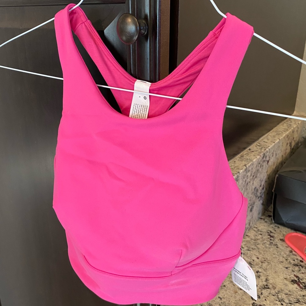 Bright pink NWT sol out sports bra from lulu